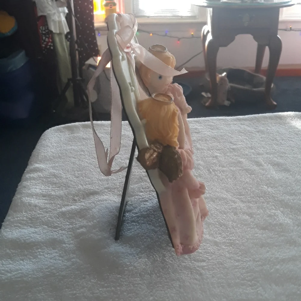 Angel photo frame with pink ribbon